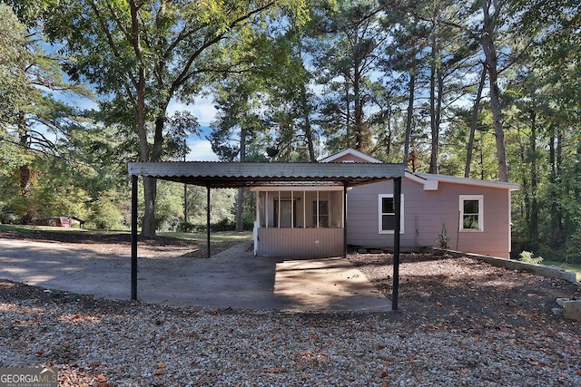 view of front facade featuring a carport