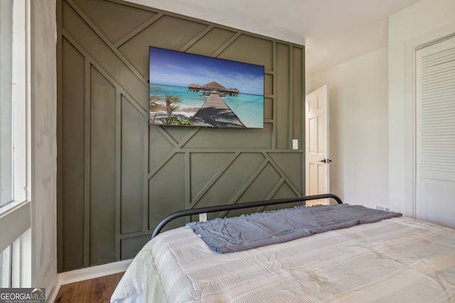 bedroom with wood-type flooring