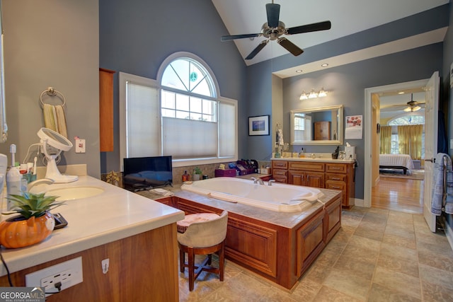 4 Bridgeview Dr SE, Rome, GA 30161 - bathroom featuring vanity, high vaulted ceiling, ceiling fan, and a garden tub