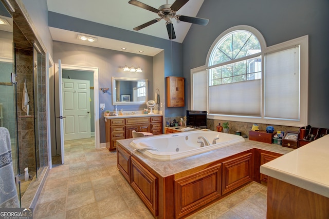 4 Bridgeview Dr SE, Rome, GA 30161 - full bath featuring vanity, high vaulted ceiling, a ceiling fan, a whirlpool tub, and a shower stall