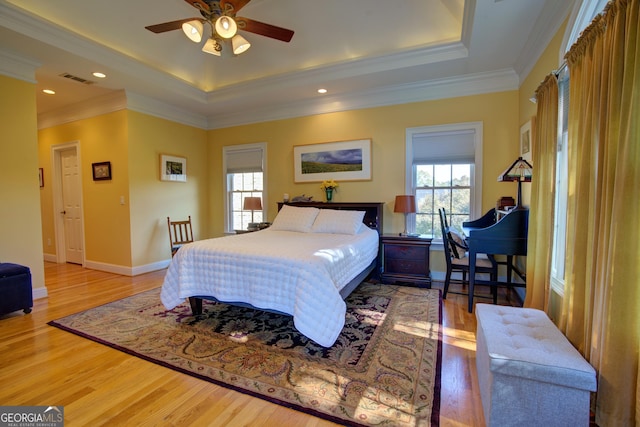 4 Bridgeview Dr SE, Rome, GA 30161 - bedroom featuring a raised ceiling, multiple windows, and wood finished floors
