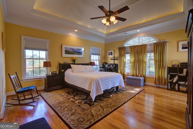 4 Bridgeview Dr SE, Rome, GA 30161 - bedroom with a raised ceiling, multiple windows, and light wood-type flooring