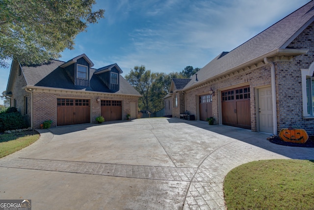 view of property exterior with a garage