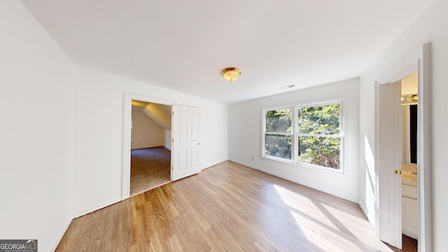 15 Greenridge Way, Newnan, GA 30265 - unfurnished bedroom featuring light wood-style floors, baseboards, and visible vents