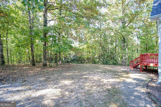 15 Greenridge Way, Newnan, GA 30265 - view of yard with a deck and a wooded view