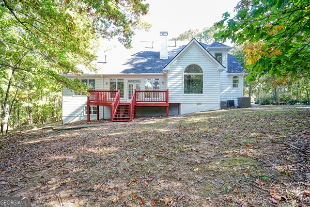 15 Greenridge Way, Newnan, GA 30265 - rear view of property featuring crawl space, a chimney, a wooden deck, cooling unit, and a shingled roof