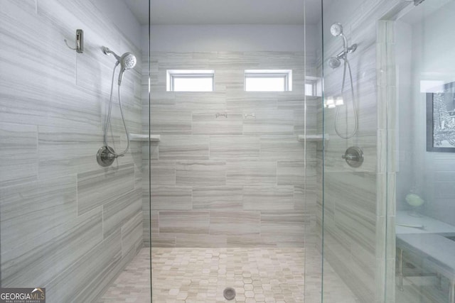 bathroom featuring an enclosed shower