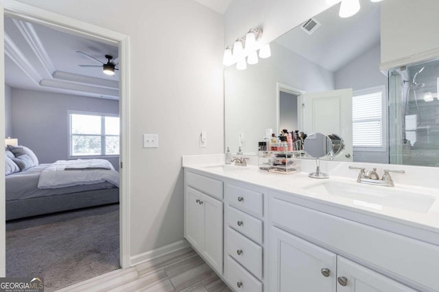 bathroom with vanity, an enclosed shower, hardwood / wood-style floors, vaulted ceiling, and ceiling fan