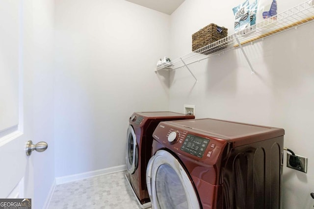 laundry area with separate washer and dryer