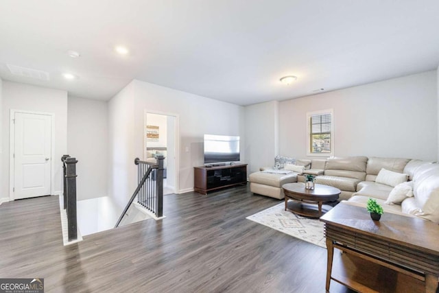 living room with dark wood-type flooring