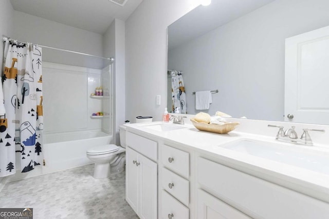 full bathroom with shower / bath combo with shower curtain, tile patterned flooring, vanity, and toilet