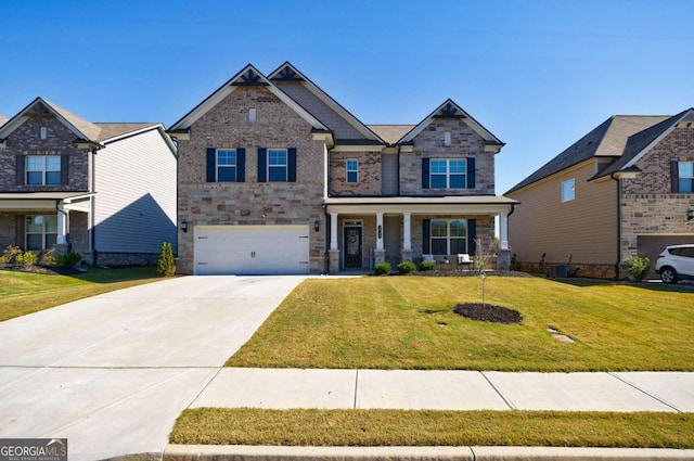 craftsman inspired home featuring a front lawn, a garage, central AC, and a porch