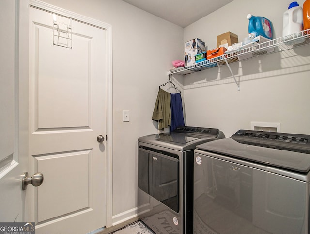 laundry area featuring separate washer and dryer