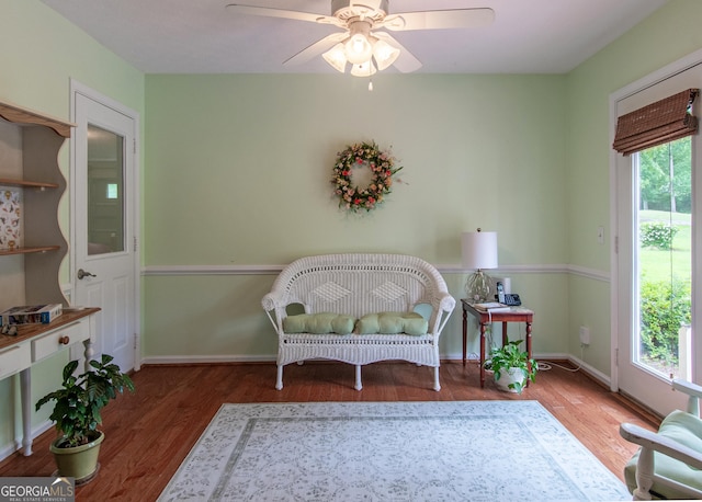 7 Stonehaven Dr, Newnan, GA 30265 - sitting room featuring wood finished floors, ceiling fan, and baseboards