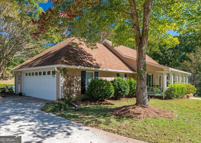 7 Stonehaven Dr, Newnan, GA 30265 - view of front of property featuring a garage, concrete driveway, a front yard, and a shingled roof