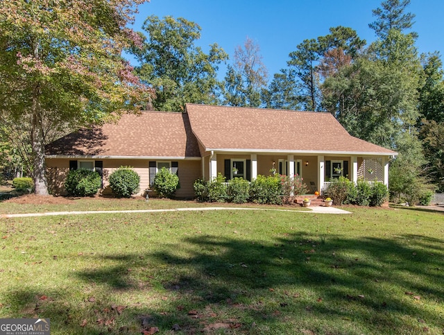 7 Stonehaven Dr, Newnan, GA 30265 - view of front of house with covered porch and a front lawn