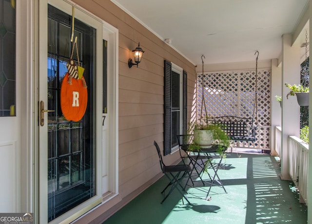 balcony featuring covered porch