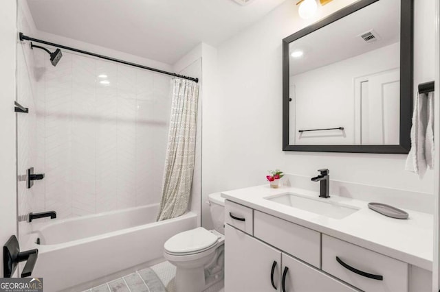 full bathroom featuring shower / tub combo, vanity, and toilet