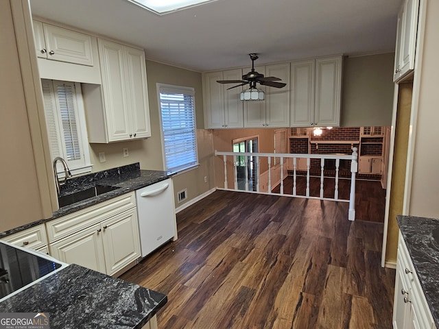 kitchen featuring white cabinets, sink, white dishwasher, and dark hardwood / wood-style floors