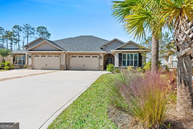 view of front of home featuring a garage