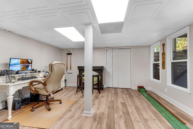 office area with light hardwood / wood-style flooring