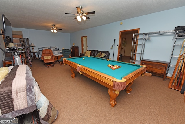 game room featuring a textured ceiling, carpet floors, billiards, and ceiling fan