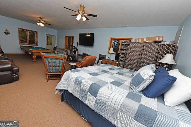 bedroom with carpet flooring, pool table, a textured ceiling, and ceiling fan