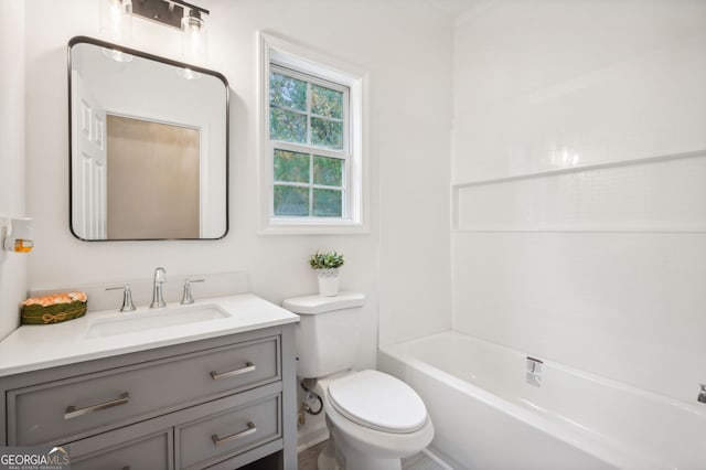 full bathroom with vanity, toilet, and  shower combination