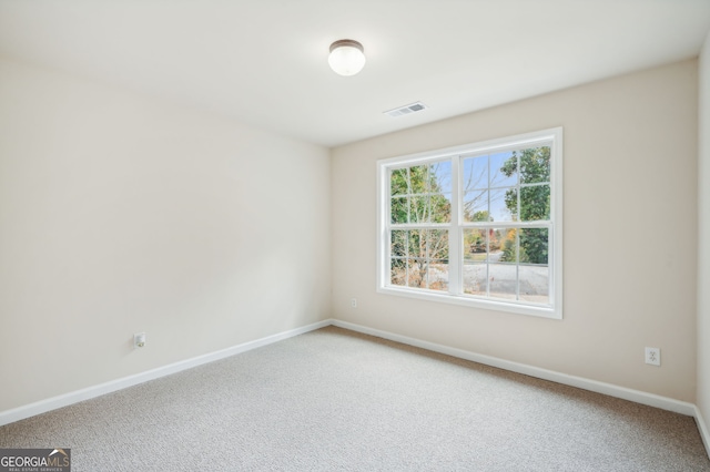 view of carpeted spare room