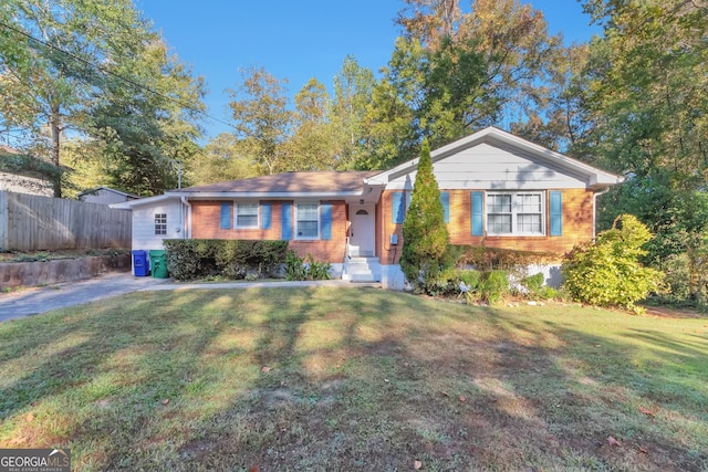 ranch-style house with a front lawn