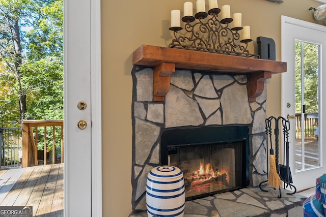 exterior details with a stone fireplace