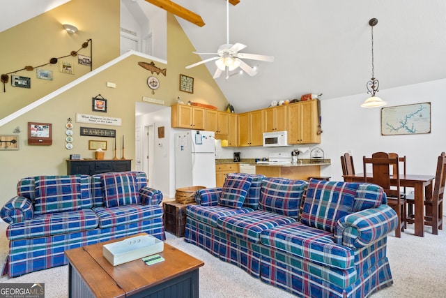 carpeted living room featuring high vaulted ceiling and ceiling fan