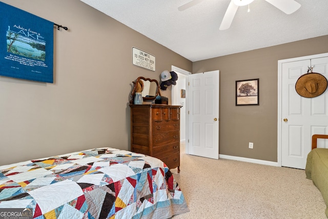 bedroom featuring a textured ceiling and ceiling fan