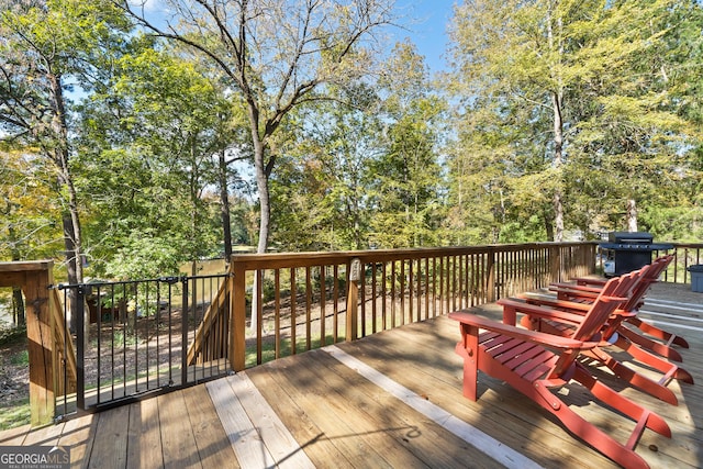 wooden terrace with grilling area