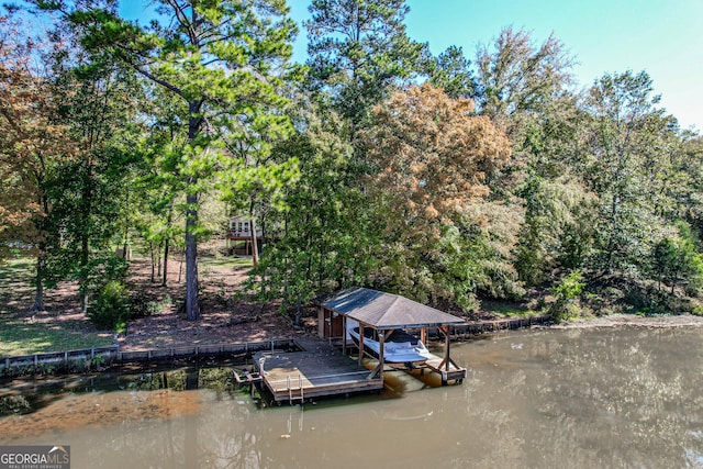 dock area featuring a water view