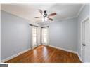 unfurnished room with hardwood / wood-style floors