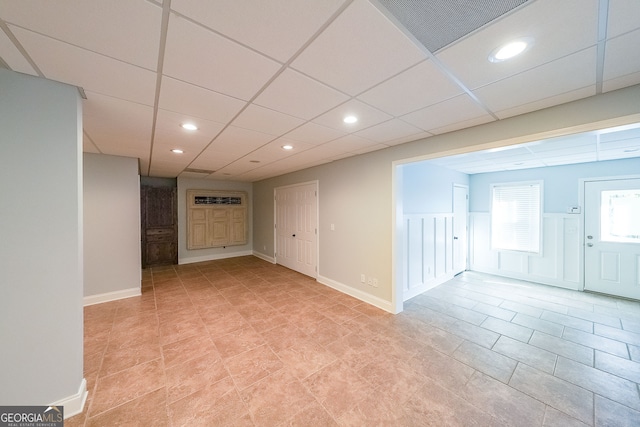 basement with a drop ceiling