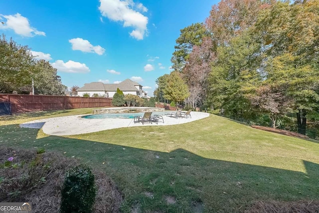 view of yard featuring a patio and a fenced in pool