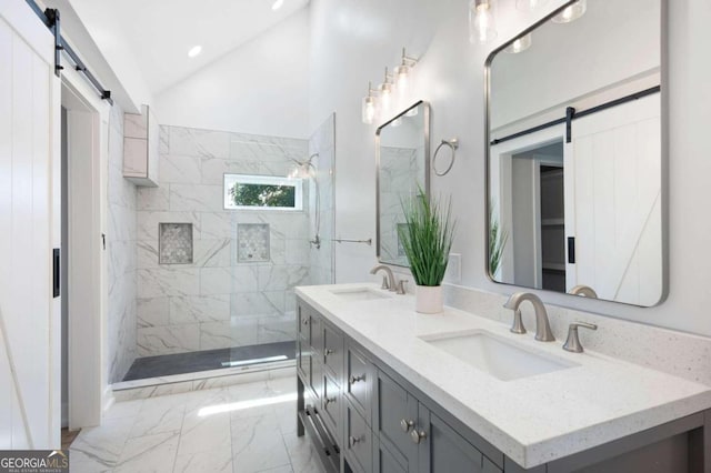 full bathroom with vaulted ceiling, a walk in shower, marble finish floor, and a sink