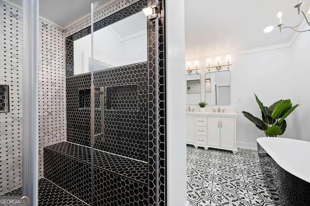 bathroom featuring vanity, a tile shower, a freestanding bath, ornamental molding, and tile patterned flooring