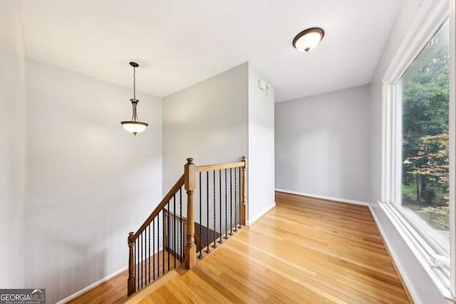 staircase featuring hardwood / wood-style flooring