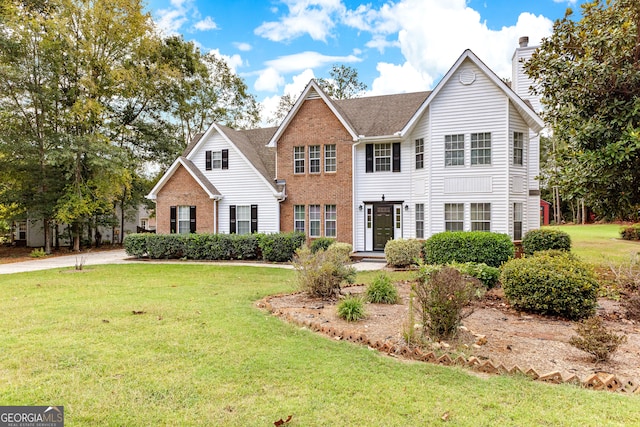 view of front of home featuring a front lawn