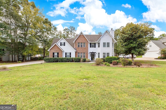 view of front of home featuring a front lawn