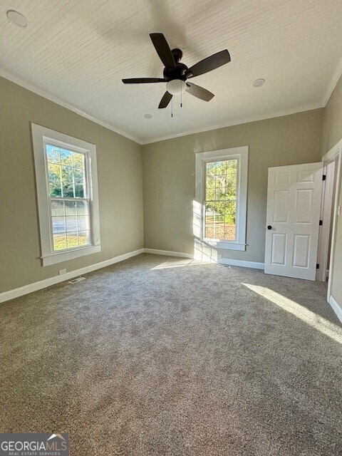 17843 Main St, Woodbury, GA 30293 - carpeted spare room featuring ornamental molding and ceiling fan