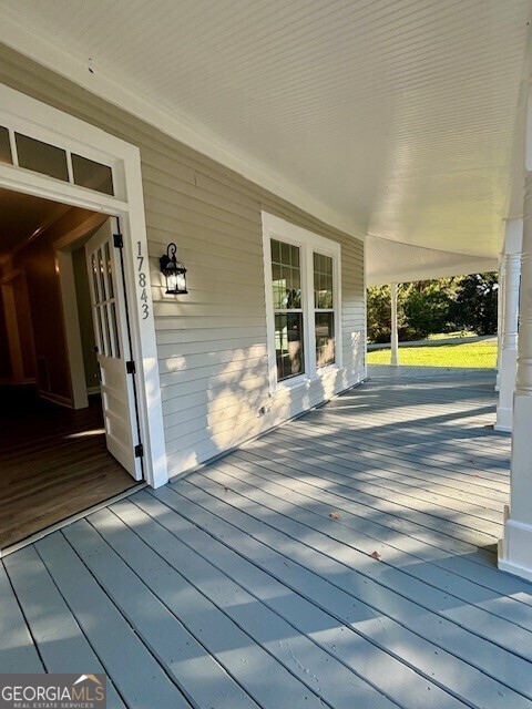 17843 Main St, Woodbury, GA 30293 - deck featuring covered porch
