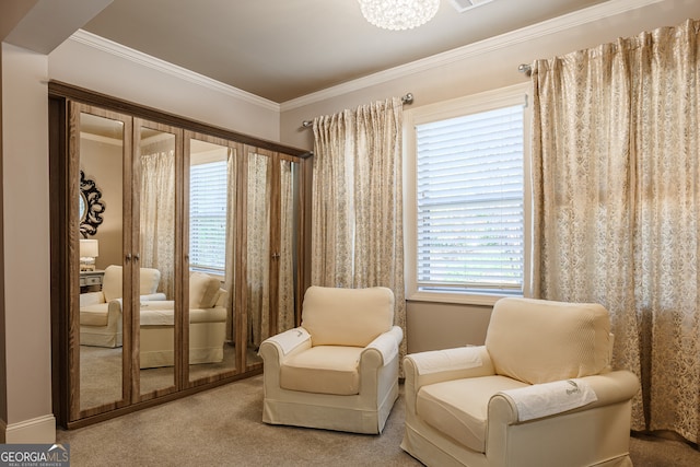 sitting room featuring crown molding, a healthy amount of sunlight, and carpet floors