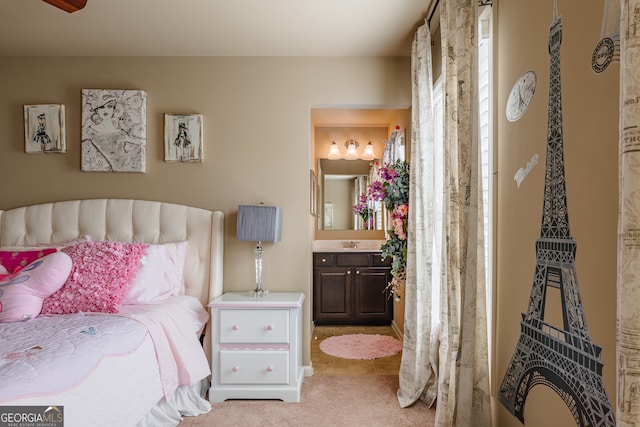 carpeted bedroom with connected bathroom