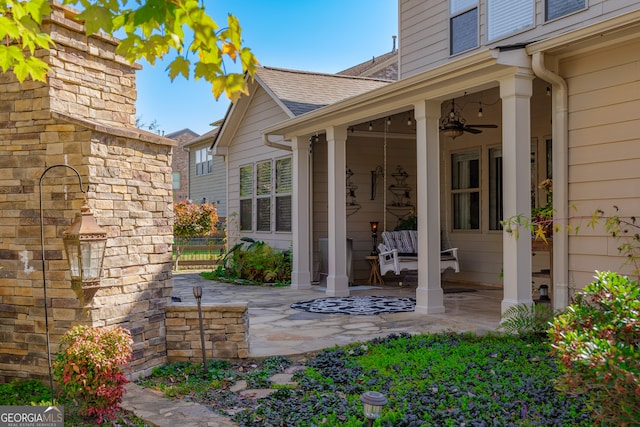 view of patio / terrace featuring ceiling fan