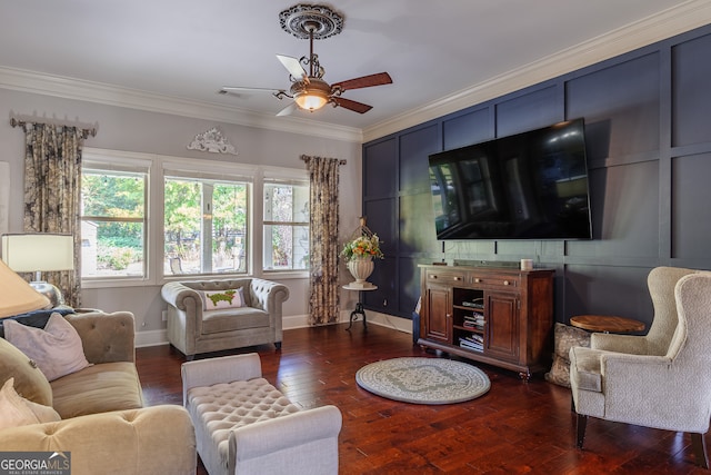 living room with ornamental molding, ceiling fan, and dark hardwood / wood-style flooring