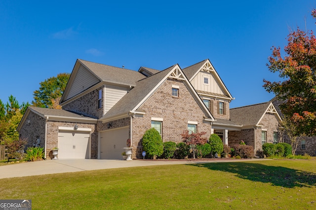 craftsman inspired home with a front lawn and a garage